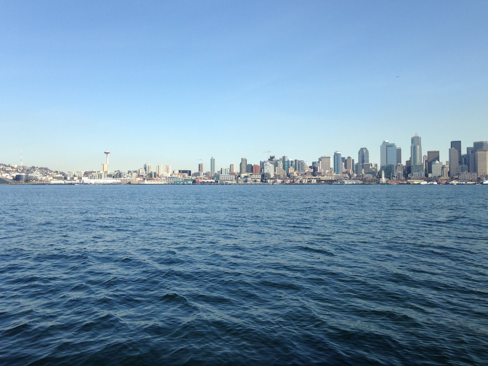 Puget Sound and Seattle, water in foreground, buildings in background