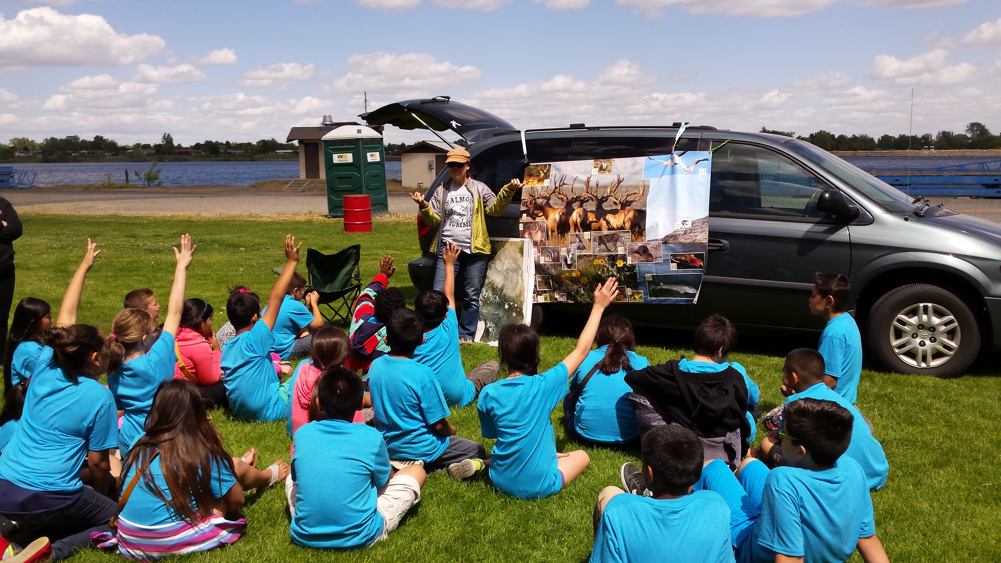 A diverse group of kids learning about environmental issues,