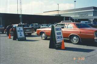 cars lined up to get emissions checked.