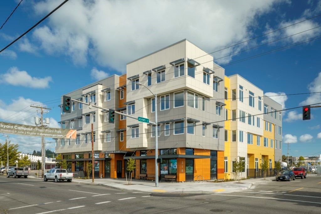 The Billy Frank Jr. Place is four-story building with commercial space on the ground level and affordable housing units on the floors above.