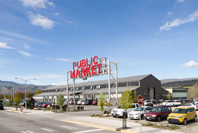 Public Market sign in front of the renovated warehouse that's on top of a cleaned up landfill.