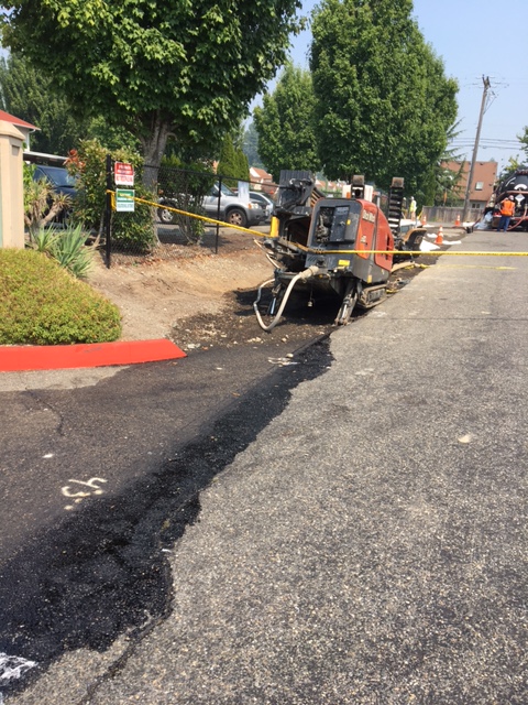 Fuel spill stain on pavement.