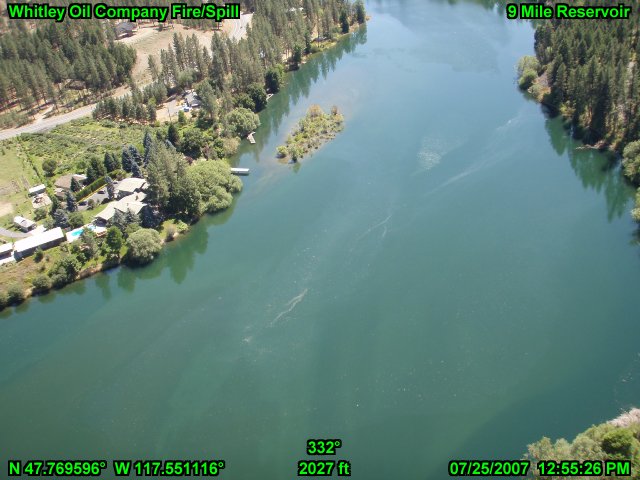 Aerial photo of light oil sheen visible near Nine Mile Reservoir.