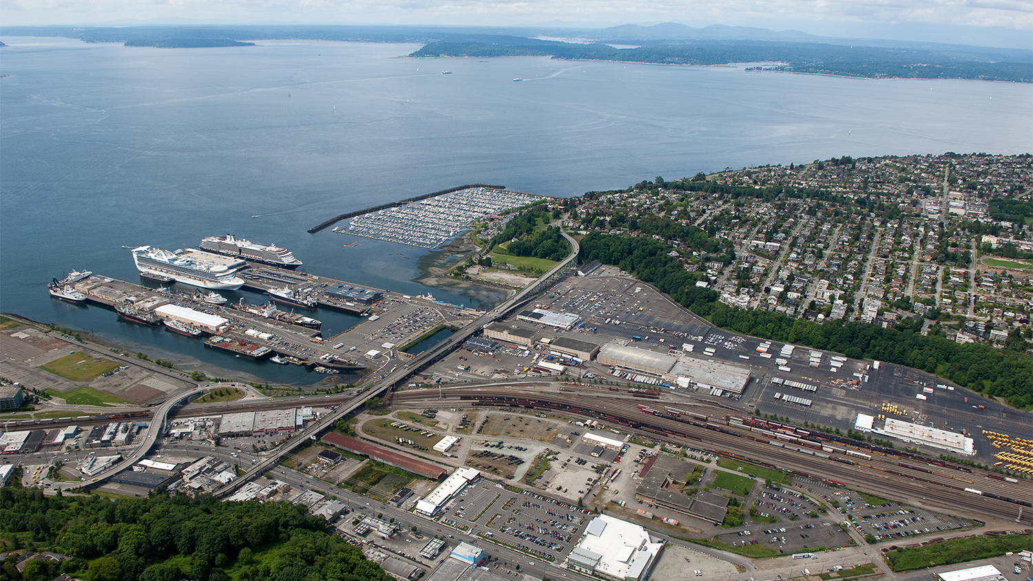 Aerial view of the Terminal 90/91 complex, with the piers seen on the left.