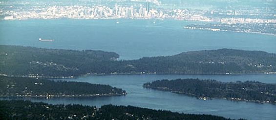 Aerial photo of Puget Sound showing Seattle in the distance. 