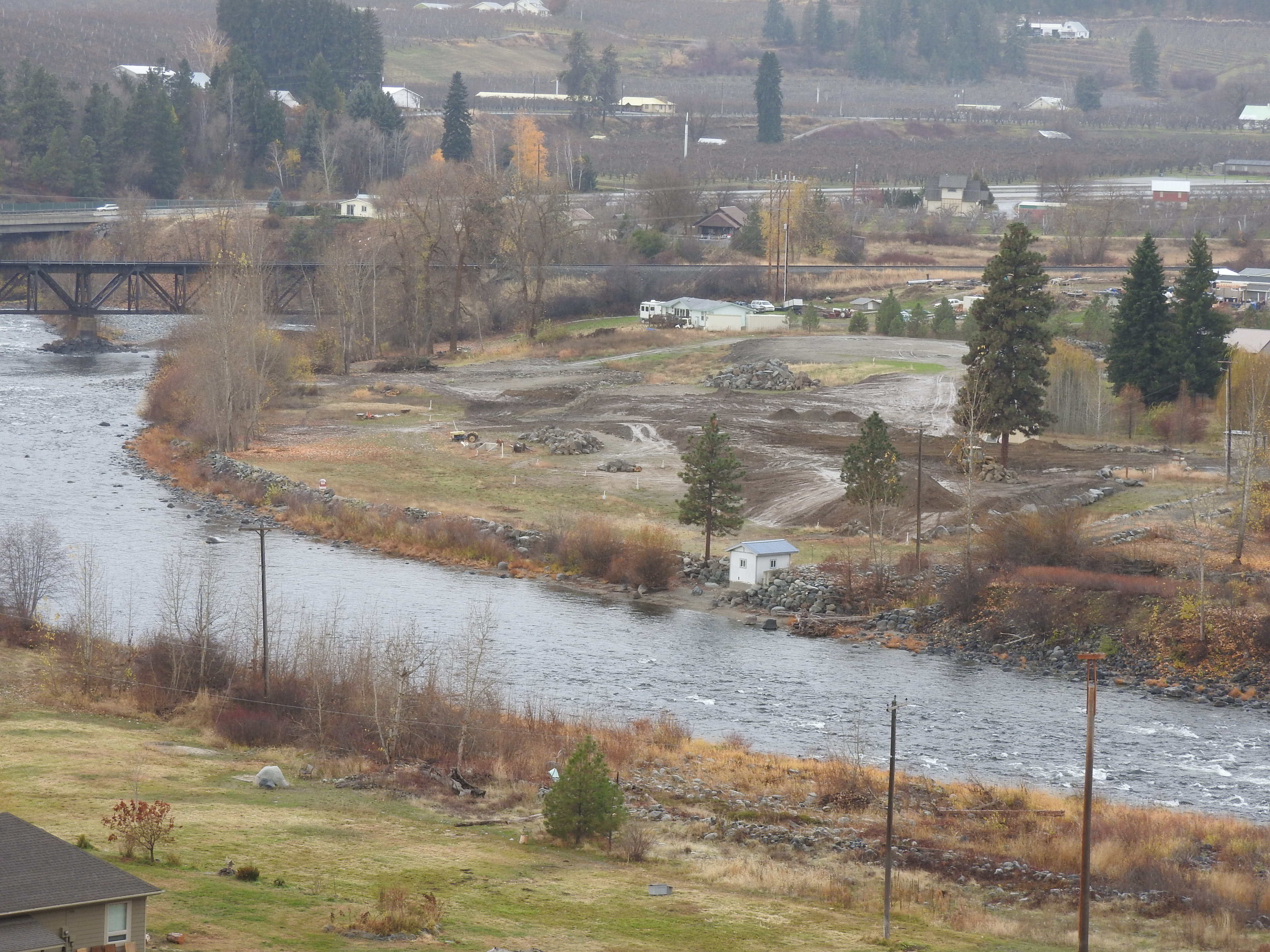 Photo showing illegal construction work on Kinzel property along Wenatchee River in Chelan County.