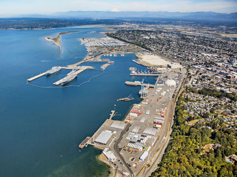 Aerial image of Everett's industrial waterfront looking north from the Port of Everett's South Terminal.  The image shows East Waterway and surrounding industrial properties including Port terminals and Naval Station Everett.