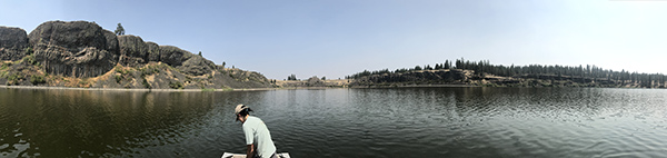 Eastern Washington lake with scientist in foreground.