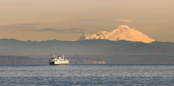 Salish Sea image with ferry crossing channel. Mount Baker view in the background.