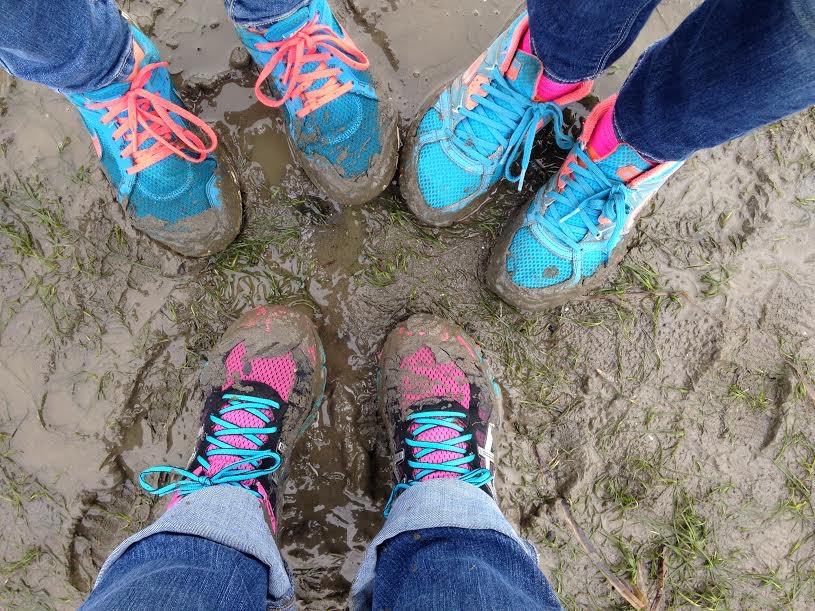 Children with muddy sneakers gather at Padilla Bay.