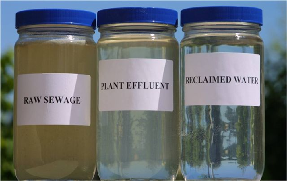 Picture of three bottles of water. Raw Sewage: a cloudy brown liquid.  Treatment Plant Effluent: clear water but with a brown tint. Reclaimed water: clear water.