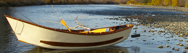 Photo depicts a  closeup view of a drift boat on the Yakima River