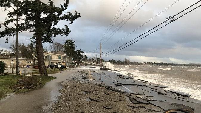 Whatcom county storm flooding, showing road damage from seawater surges