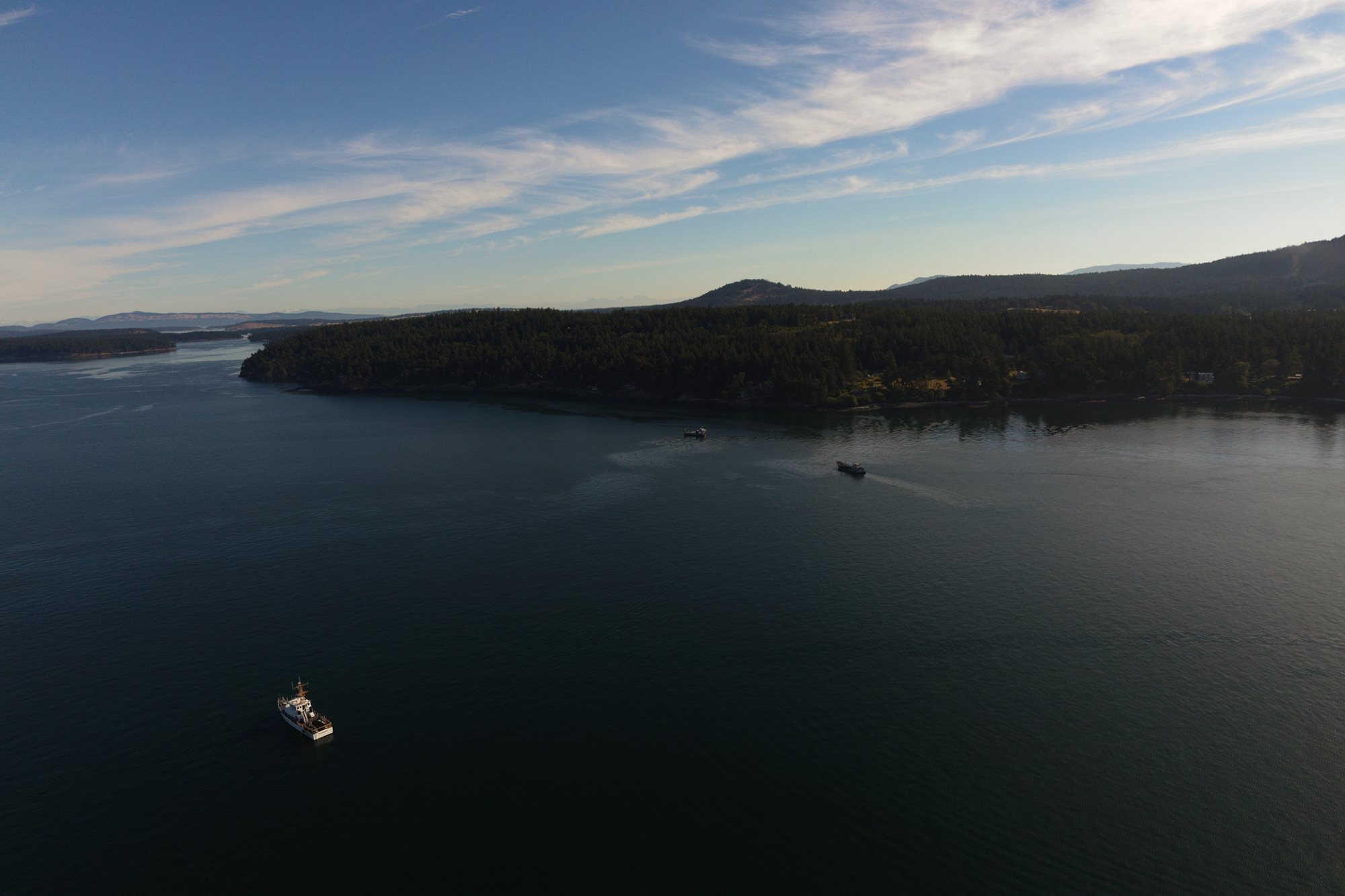 Sheen from diesel fuel in the water near an island