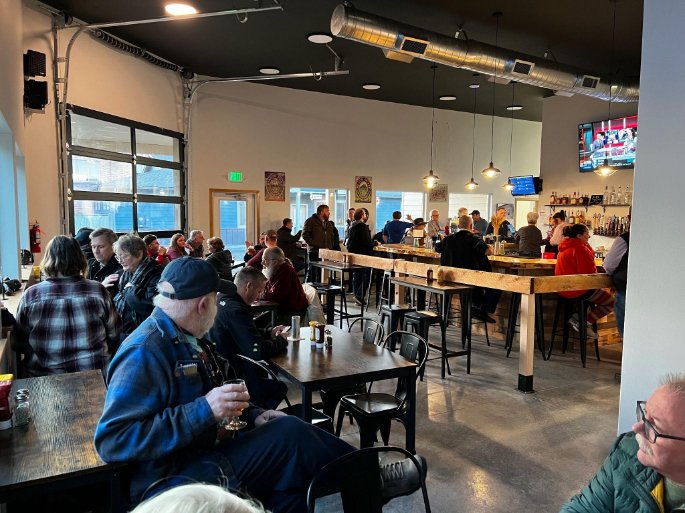 Patrons enjoy the grand opening of Palouse Brewing Company, built on the former Palouse Producers brownfield.