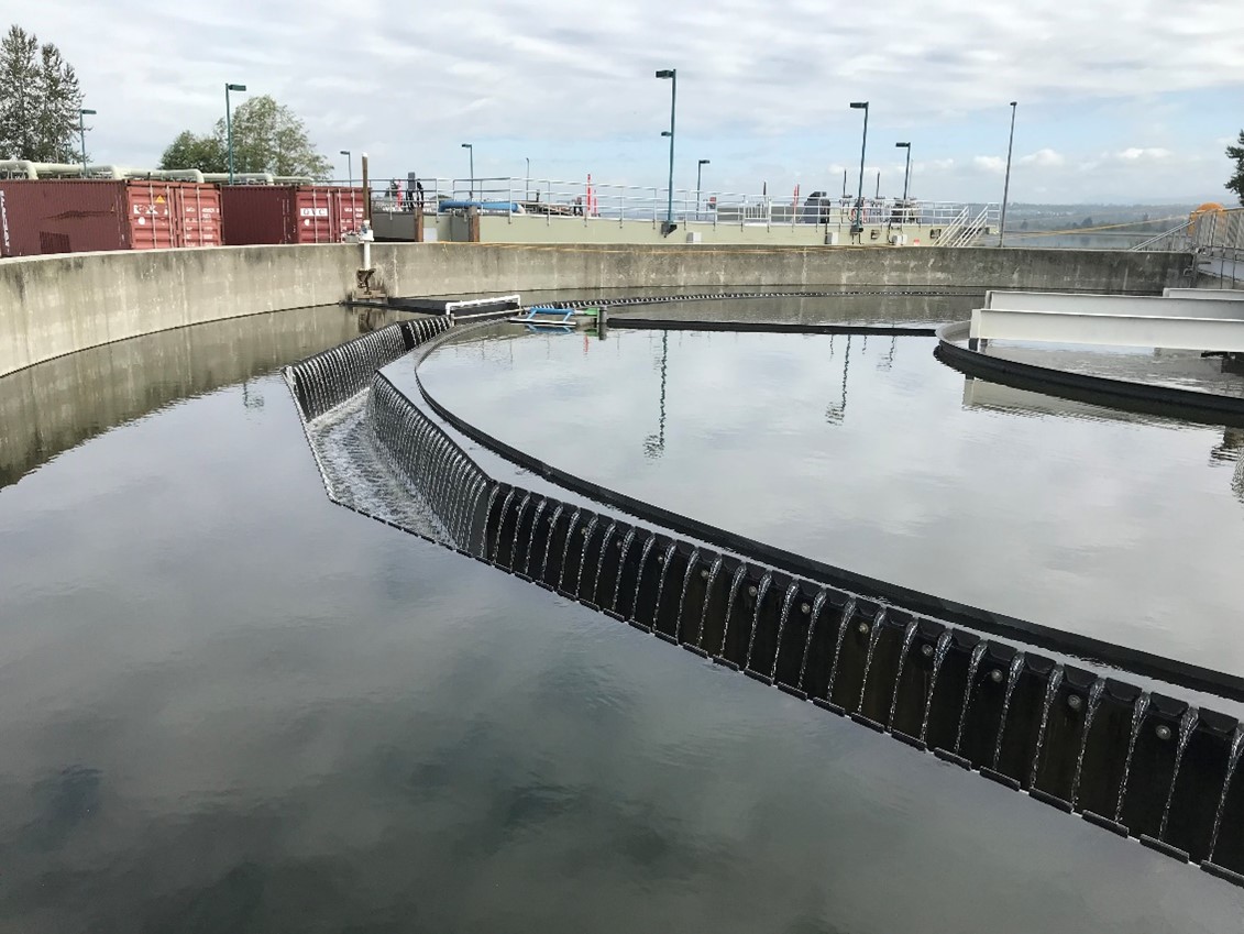 Wastewater treatment settling tank, with view of the water inside