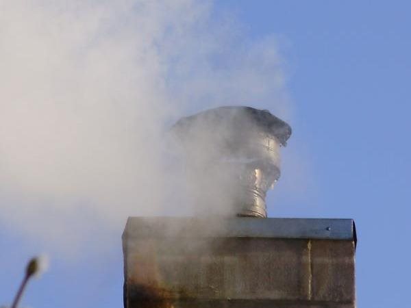 Smoke leaving chimney 