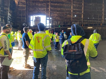 A group of facility operators in their personal protective equipment.